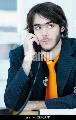 Close up of a businessman using a telephone Stock Photo