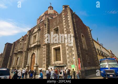 Tourists in front of a cathedral, Temple of Holy Ines, Mexico City, Mexico Stock Photo