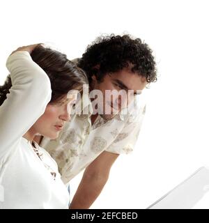 Young couple reading documents Stock Photo