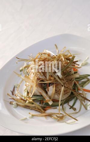 Close-up of fish fillets in a plate Stock Photo