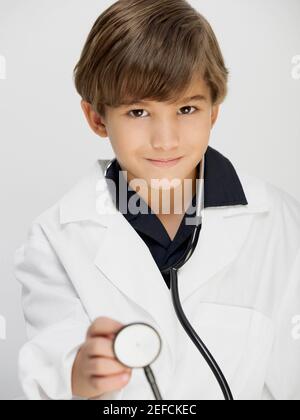 Portrait of a boy dressed as a doctor Stock Photo