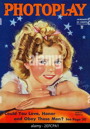 SHIRLEY TEMPLE (1928-2014) American film actress on the cover of American Photoplay in January 1935. Stock Photo