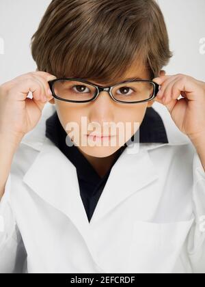 Portrait of a boy dressed as a doctor Stock Photo