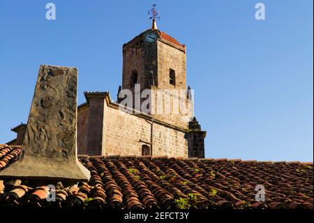 Low angle view of a weather vane on the top of a tower, Spain Stock Photo