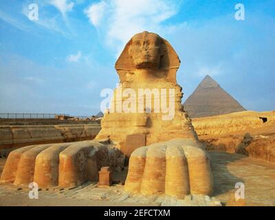 Sphinx in front of pyramids, Giza, Cairo, Egypt Stock Photo