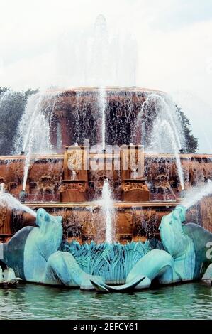 Water spraying from the mouth of a bronze statue, Clarence Buckingham Fountain, Chicago, Illinois, USA Stock Photo