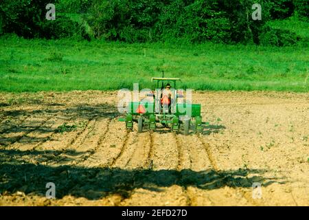 Planting corn in Virginia Stock Photo