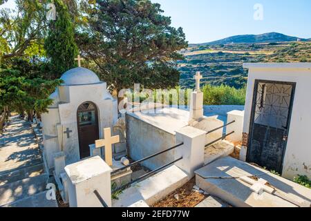 Greek orthodox graveyard. Ancient grave on the cemetery in Lefkes, Paros, Greece Stock Photo