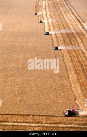 Aerial view of wheat harvest and combines in a background, Burlington, Colorado Stock Photo