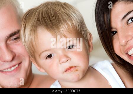 Close-up of parents with their son Stock Photo