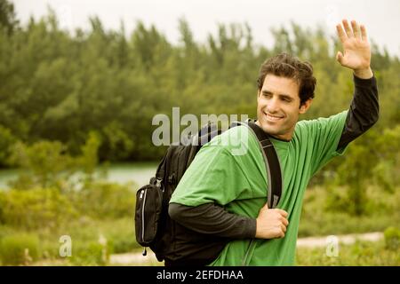 Close-up of a mid adult man waving his hand Stock Photo