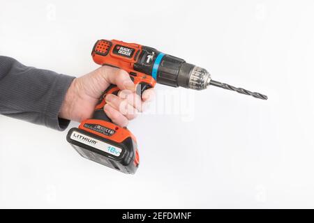 12 volt battery attached to a black and decker cordless drill Stock Photo -  Alamy