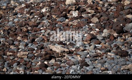 Nature background from gray sea pebbles or lava rocks Stock Photo