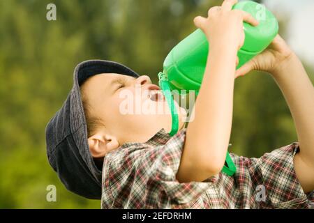 Hispanic boy water bottle hi-res stock photography and images - Alamy