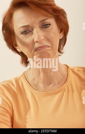 Portrait of a senior woman making a face Stock Photo