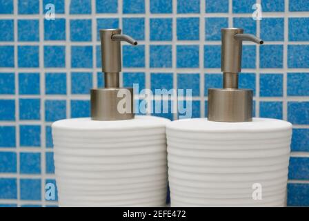 Close up of two soap dispensers Stock Photo