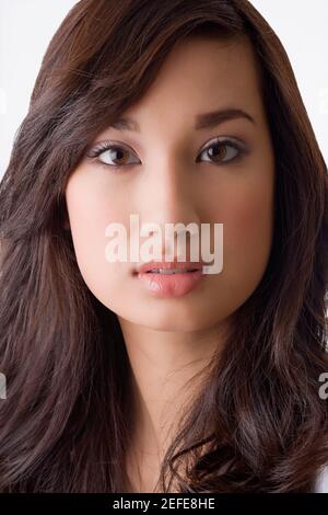 Portrait of a young woman looking serious Stock Photo