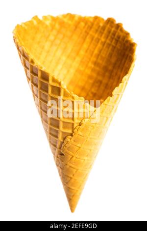 Big, empty, crunchy ice cream cone isolated on white background Stock Photo