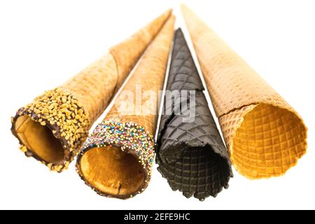 Several different empty ice cream cones isolated on white background Stock Photo
