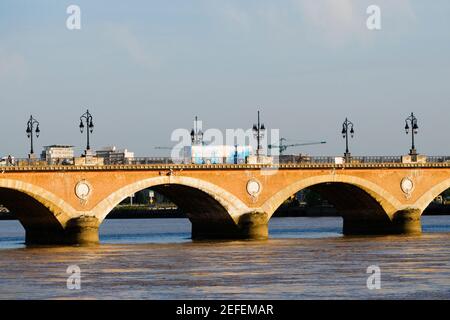 Arch bridge across a river, Pont De Pierre, Garonne River, Bordeaux, Aquitaine, France