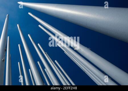 Low angle view of flag poles, Bordeaux, Aquitaine, France Stock Photo