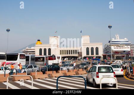 Vehicles parked out side of a harbor, Stazione Marittima, Naples, Naples Province, Campania, Italy Stock Photo