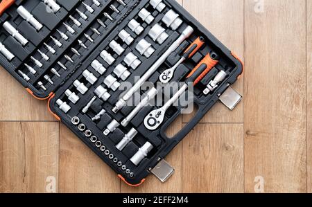 Tool Kit for the Car. Various metal tools on wooden background Stock Photo