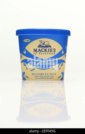 Mackies of Scotland traditional ice cream 1 litre carton on a white background with a reflection. Stock Photo
