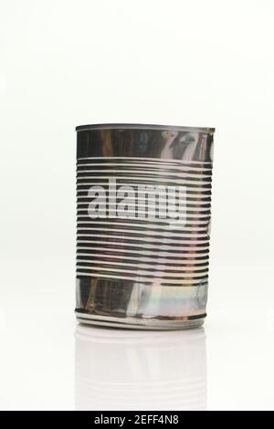 De-labelled Aluminium food cans shot on white background with reflection Stock Photo