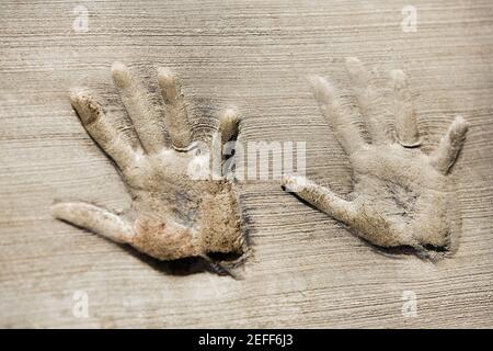 Close-up of handprints on a wall Stock Photo