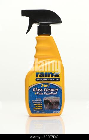 Rainx Glass and repellent cleaner for cars windscreens shot on a white background with a reflection. Stock Photo