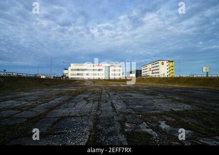 Lautzenhausen, Germany. 16th Feb, 2021. A building with the inscription 'Frankfurt Hahn Airport' stands on the airport grounds. Credit: Andreas Arnold/dpa/Alamy Live News Stock Photo