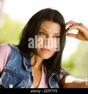 Close-up of a young woman looking serious Stock Photo