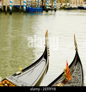 High angle view of two gondolas in a canal, Venice, Veneto, Italy Stock Photo