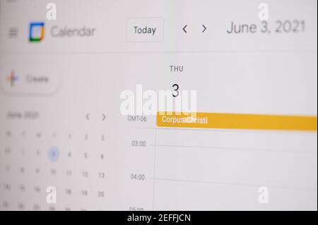 New york, USA - February 17, 2021: Corpus Christi 3 of June on google calendar on laptop screen close up view. Stock Photo