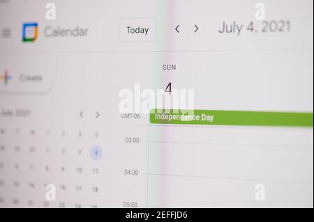 New york, USA - February 17, 2021: Independence day 4 july  on google calendar on laptop screen close up view. Stock Photo