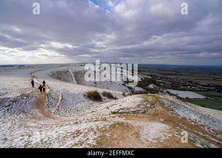 People walking towards  Truleigh Hill from Devils Dyke near Brighton, East Sussex, England, Uk Stock Photo
