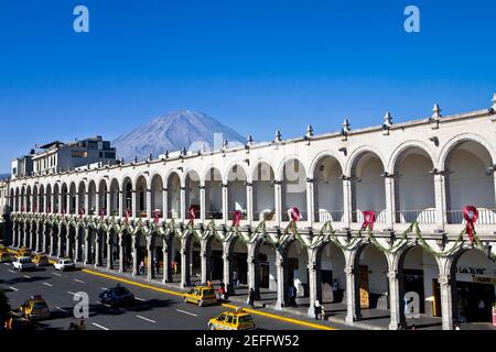 High angle view of cars moving on a road in front of a palace, Plaza-de-Armas, Arequipa, Peru Stock Photo