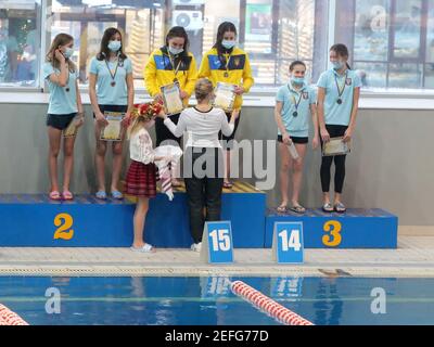 Non Exclusive: KYIV, UKRAINE - FEBRUARY 17, 2021 - Contestants accept awards during the Ukrainian Open Diving Cup 2021, Kyiv, capital of Ukraine. Stock Photo