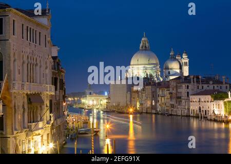 Church lit up at night, Santa Maria Della Salute, Grand Canal, Venice, Italy Stock Photo