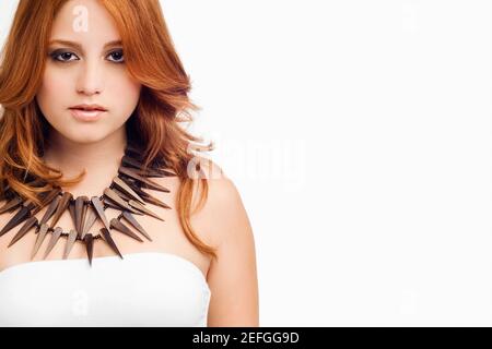 Portrait of a young woman wearing a necklace Stock Photo
