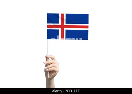 Beautiful female hand holding Iceland flag, isolated on white background. Stock Photo