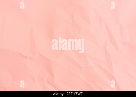 Pink paper background. Crumpled pink paper texture. Stock Photo