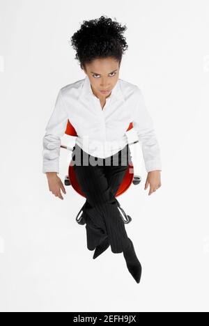 High angle view of a businesswoman sitting on an office chair Stock Photo