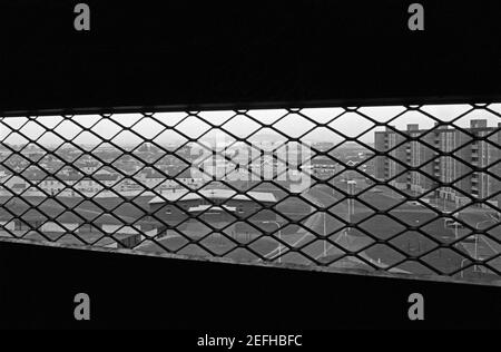 window in a staircase, Tower Block, Ballymun, April 1986, Dublin, Republic of Ireland Stock Photo