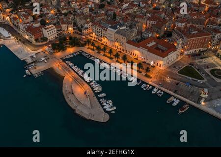 Aerial drone shot of Marina at dusk in Split old town before sunrise with light in Croatia Stock Photo