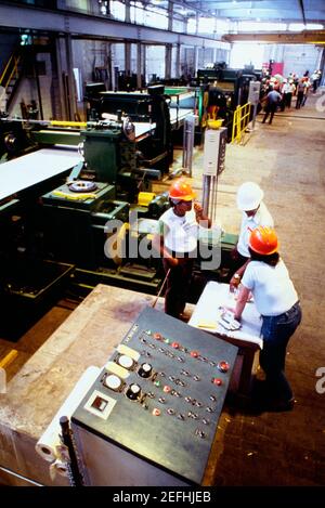 High angle view of manual workers at a steel mill, Eastern Stainless Steel, Baltimore, Maryland, USA