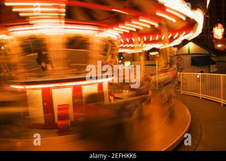 Close-up of a carousel at night Stock Photo