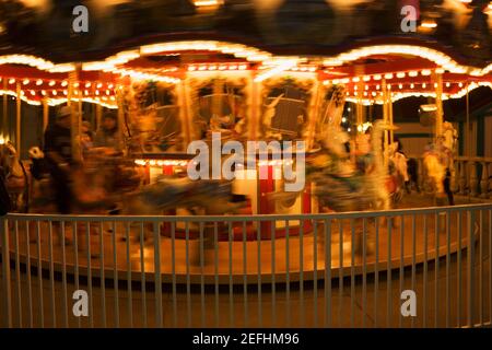 Close-up of a carousel at night Stock Photo