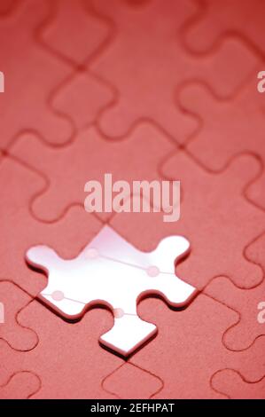 Close-up of an odd piece in a jigsaw puzzle Stock Photo